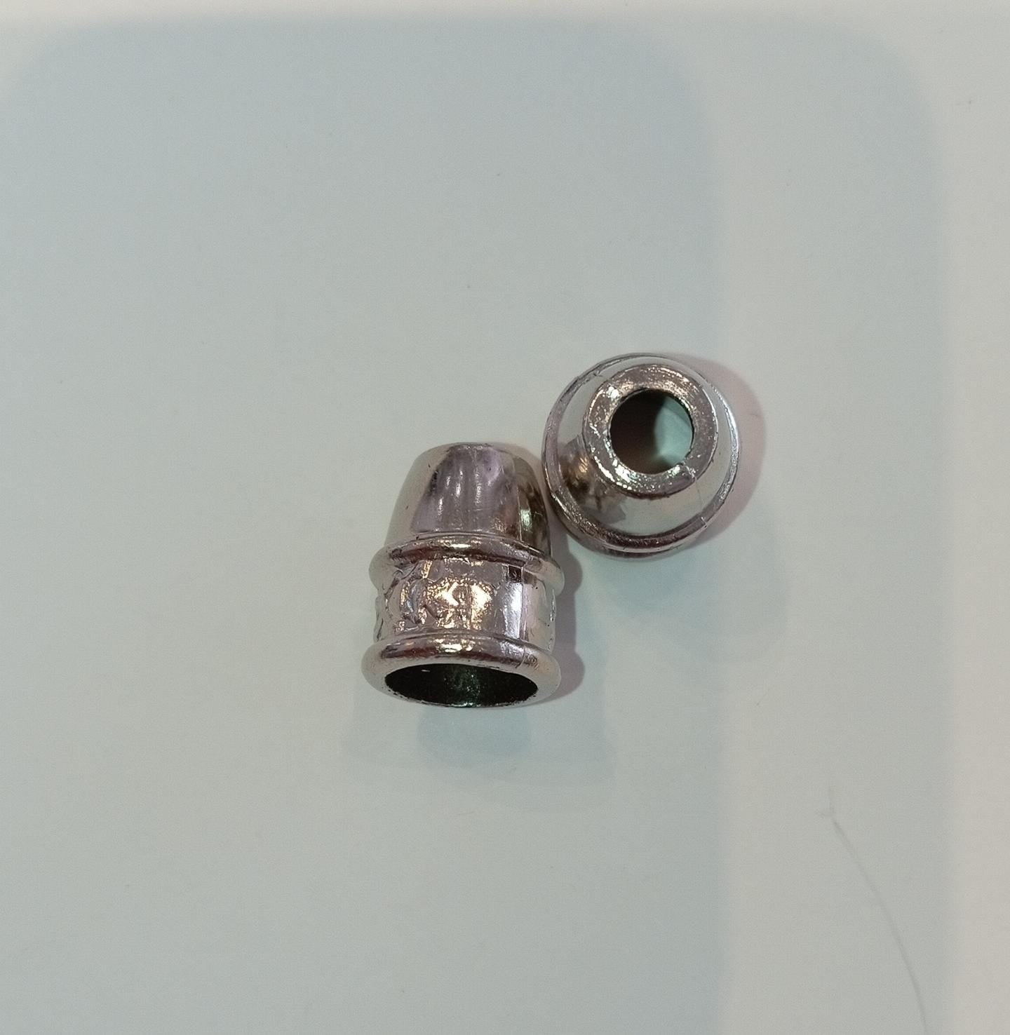 BELLOTA DE PLASTICO GRABADA NIQUEL