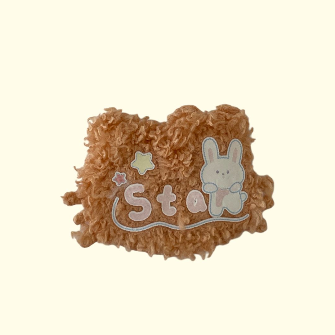 PELUCHE CONEJO ESTRELLA NARANJA