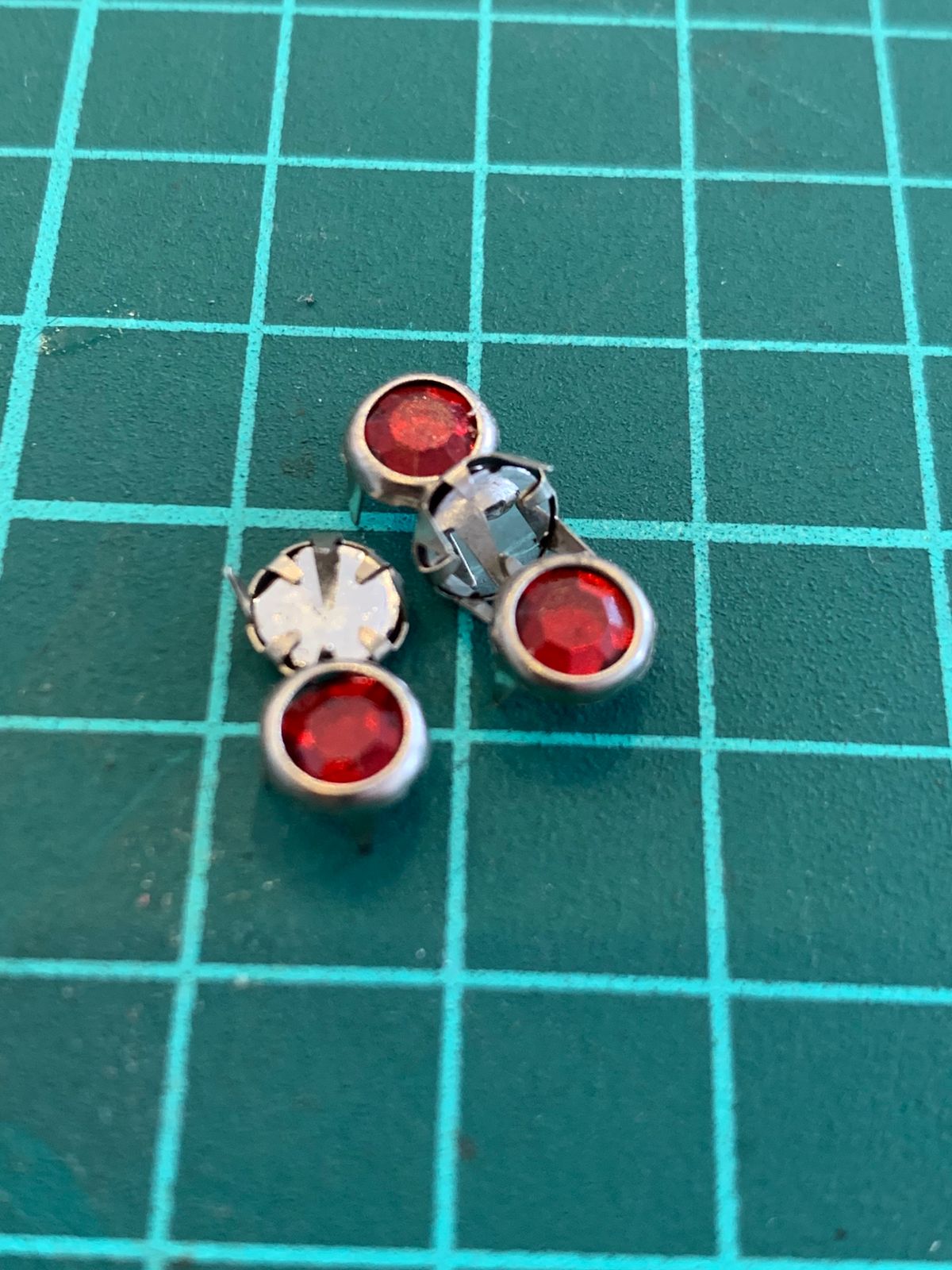 ESTOPEROL CON PIEDRA ROJO