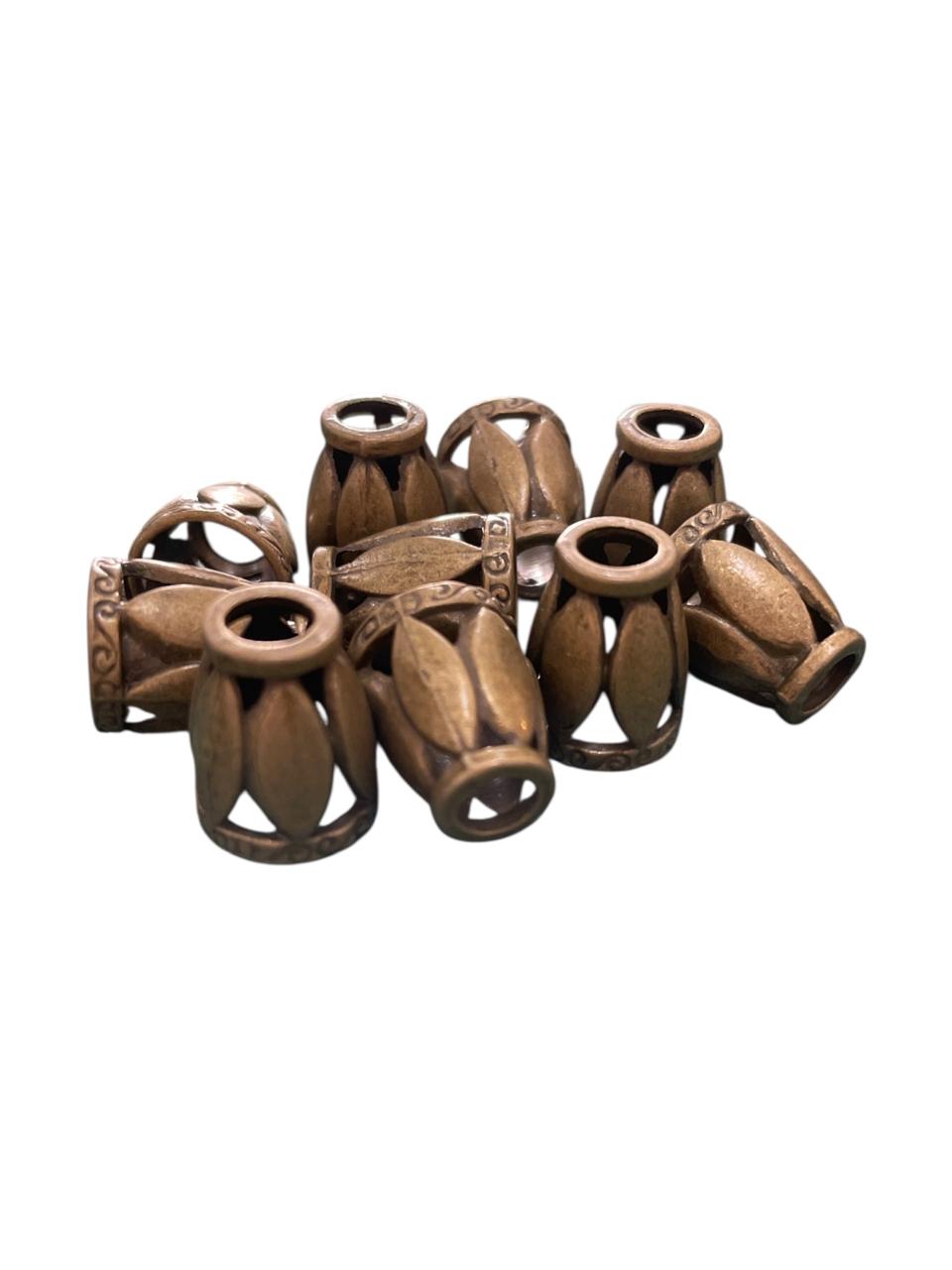 BELLOTA DE METAL CALADA LATON VIEJO