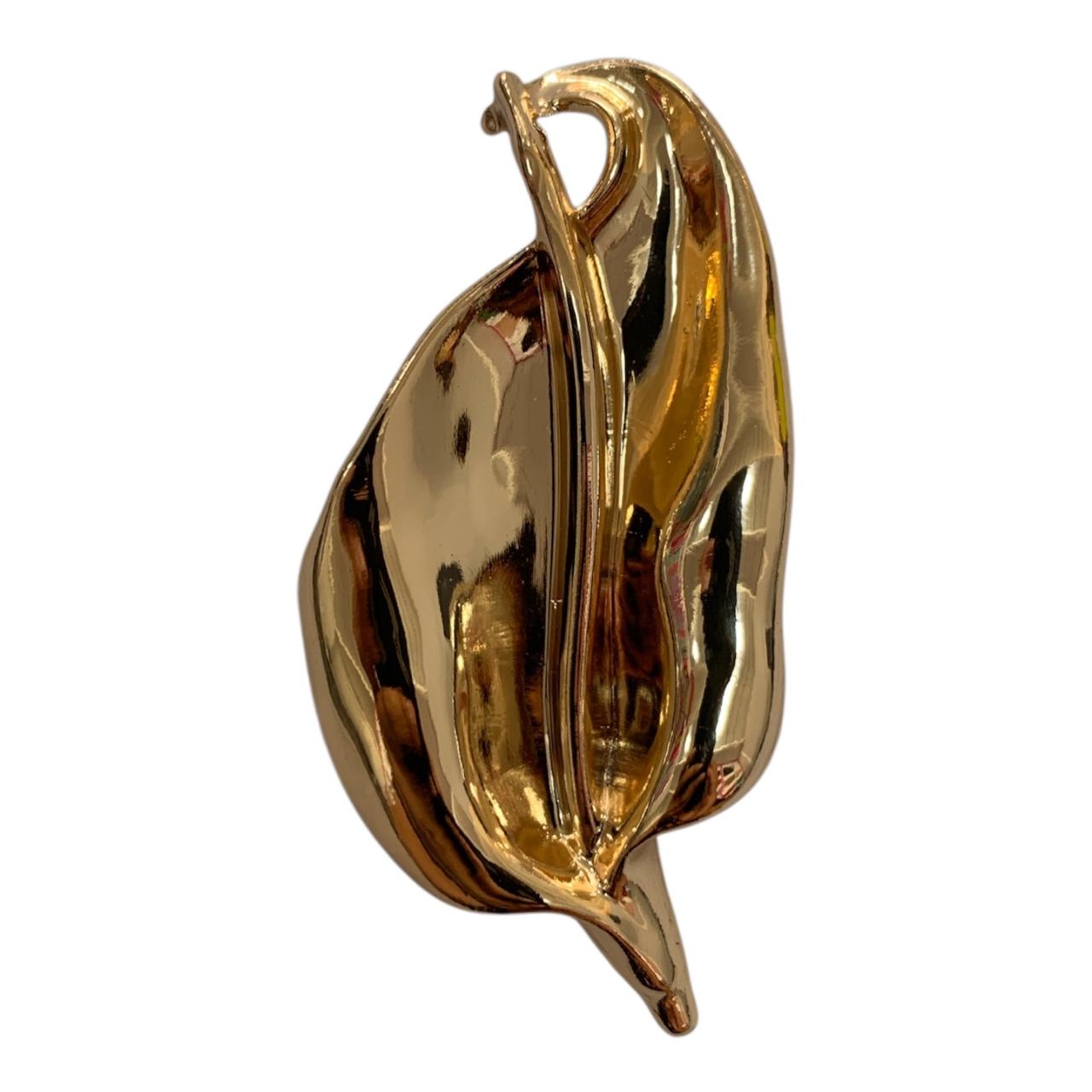 PRENDEDOR IRREGULAR HOJA