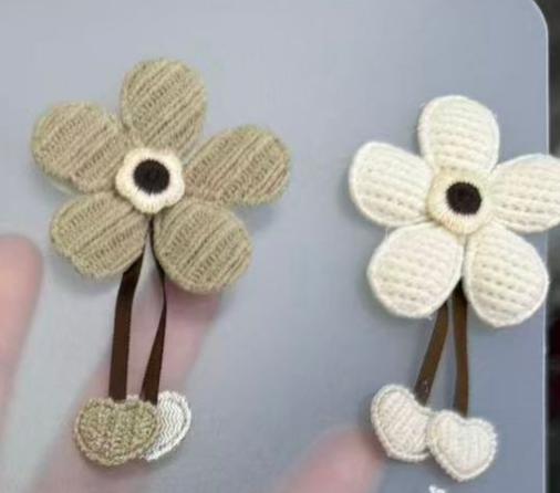 PELUCHE FLOR CON CORAZON HUESO