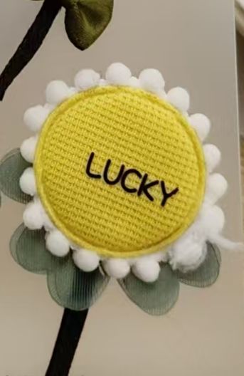 PELUCHE FLOR LUCKY AMARILLO