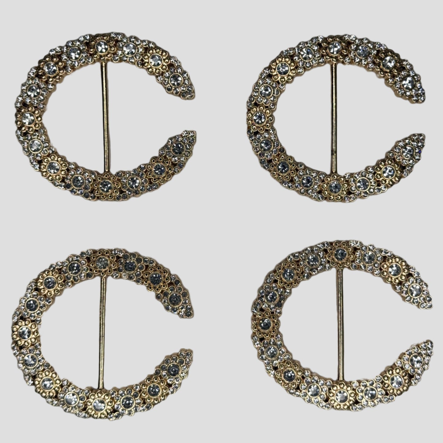 HEBILLA "C"DORADO CON PIEDRA 001