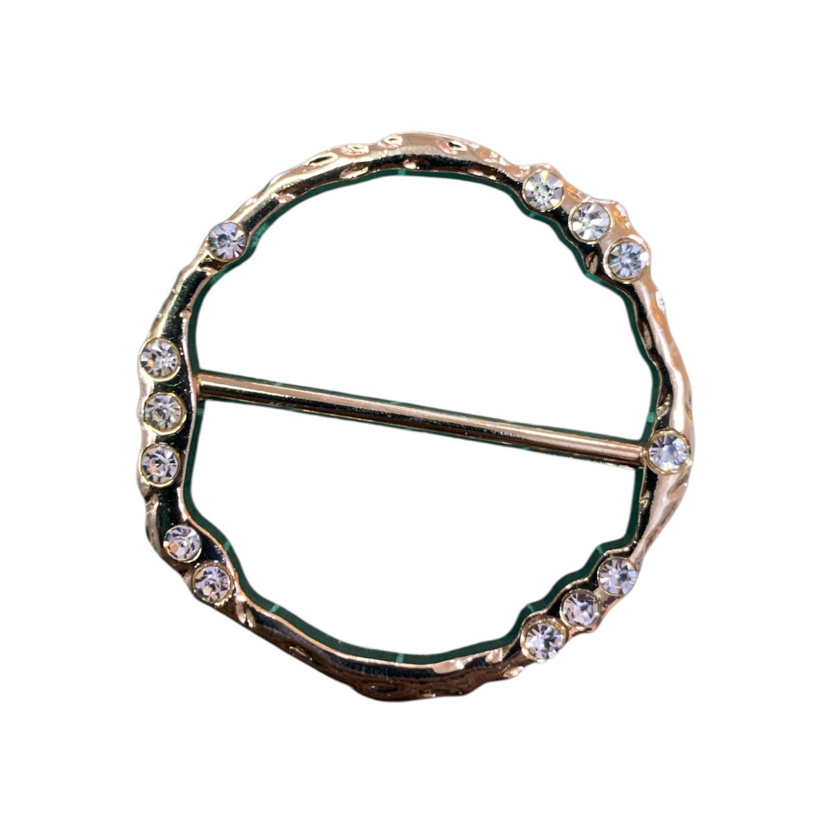 HEBILLA CIRCULAR BORDES IRREGULARES CON PIEDRA