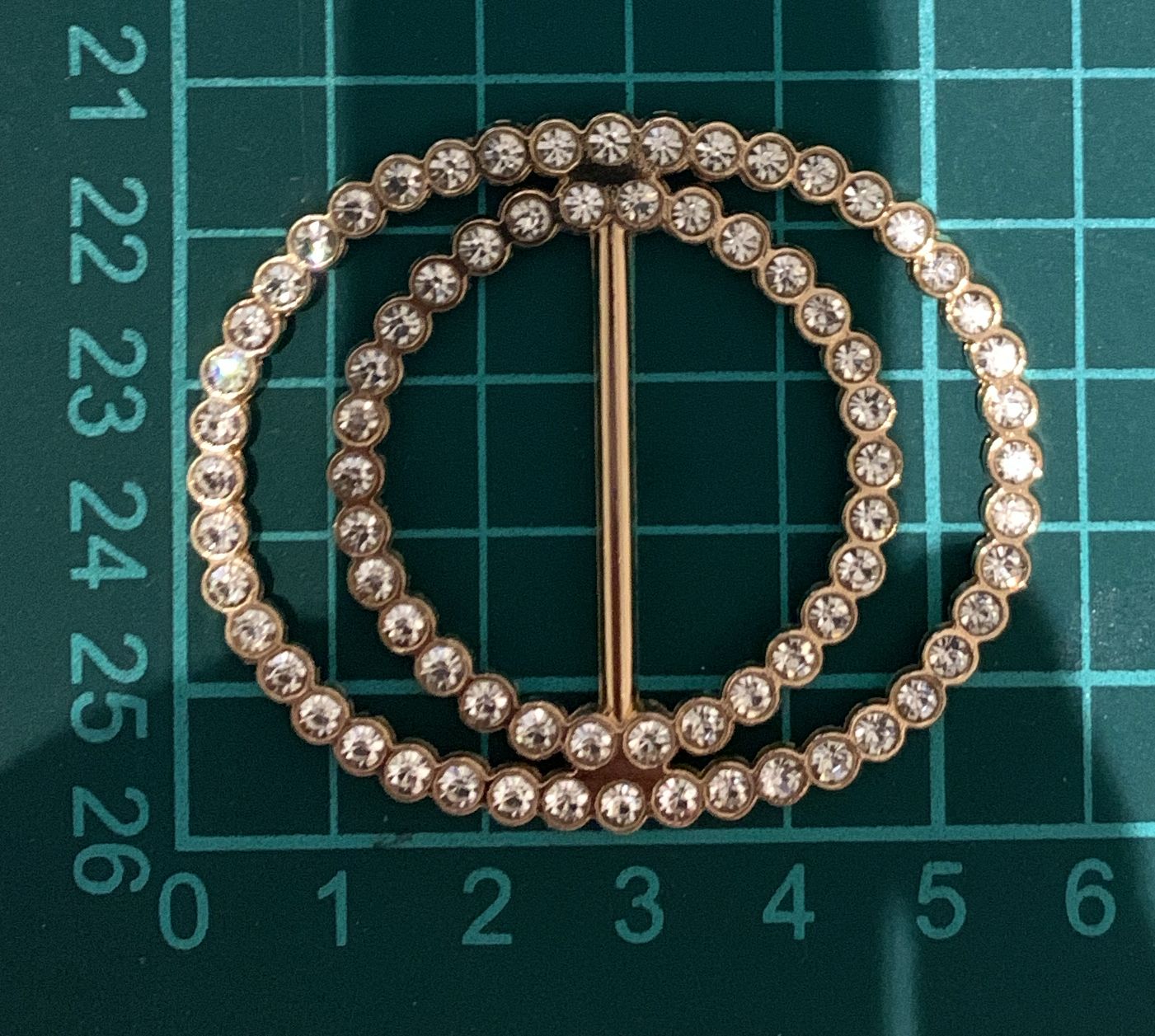 HEBILLA DOBLE CIRCULO DORADA