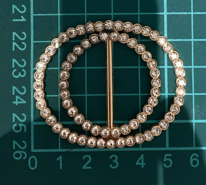 HEBILLA DOBLE CIRCULO DORADA