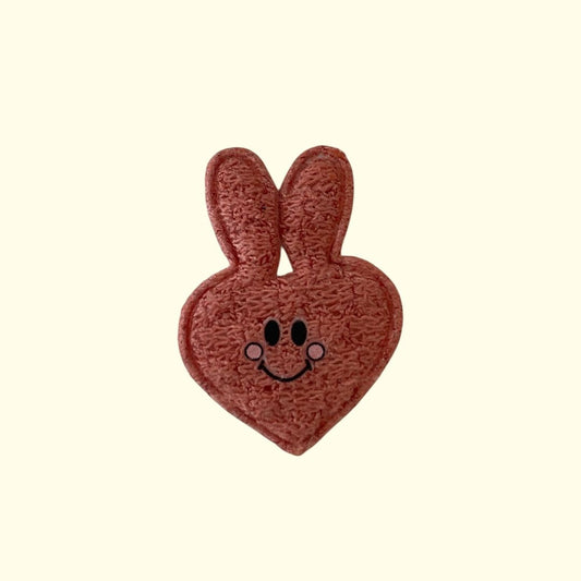 PELUCHE CORAZON OREJA DE CONEJO CORAL