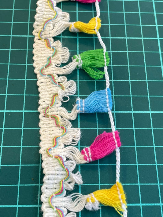 MILLARE HUESO CON BORLAS COLORES
