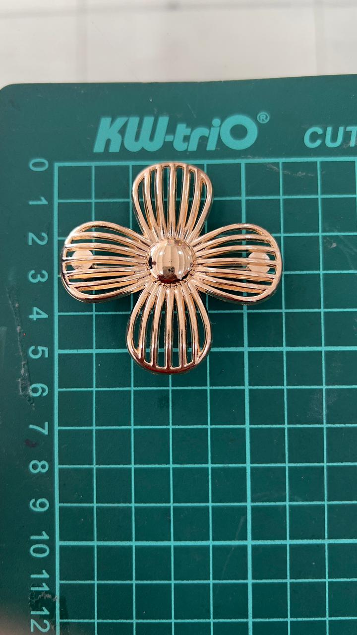 HERRAJE FLOR RAYAS 4 PETALOS ORO ROSA