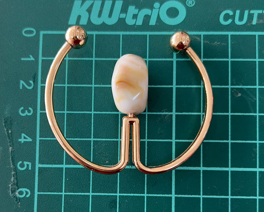 HEBILLA W CON PIEDRA AMBAR