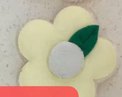 PELUCHE FLOR AMARILLO CON HOJITA