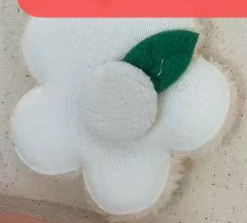 PELUCHE FLOR HUESO CON HOJITA