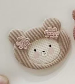 PELUCHE DOMPLING CON OREJAS DE OSO AMARILLO