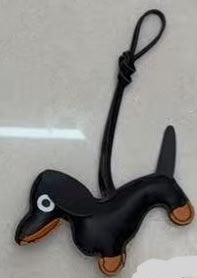 CHARM PERRO SALCHICHA NEGRO CON CAFE