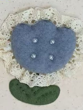 PELUCHE FLOR AZUL CON PERLAS