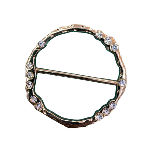 HEBILLA CIRCULAR BORDES IRREGULARES CON PIEDRA